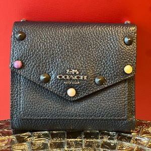 Coach navy small envelope wallet with rivets Excellent condition. LIKE NEW